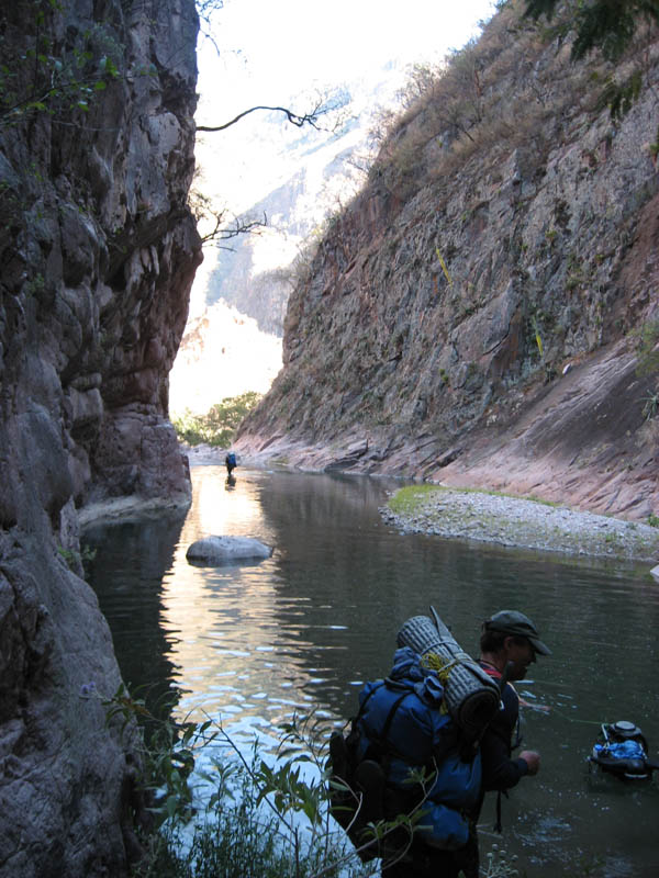 Canyoning in the Rio Urique with a chalupa on your back.